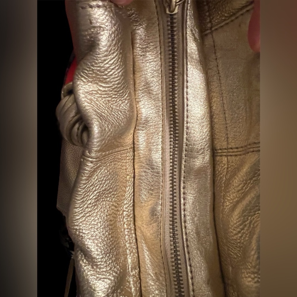 Michael Kors Metallic Gold Leather Drawstring Shoulder Bag. - Picture 7 of 16